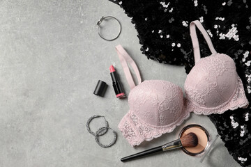 Sticker - Beautiful lace bra and accessories on grey background, flat lay. Space for text