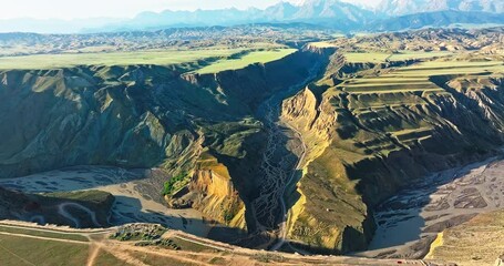 Wall Mural - Spectacular Anjihai Grand Canyon natural landscape in Xinjiang. Famous earthquake fault zone scenery in China. Aerial view of mountain faults and canyon rivers.