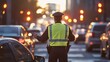 © InfinityArtCreator - A police officer in a reflective vest directs traffic during sunset, surrounded by vehicles on a bustling city street.