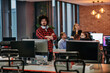 © .shock - Strategic Business Meeting: Group of Professionals Collaborating in Office Using Computers
