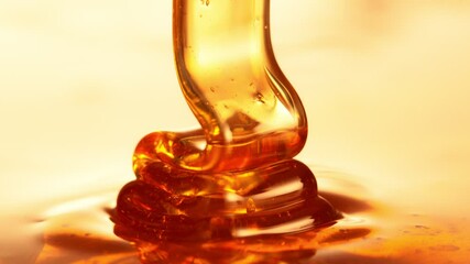Fototapete - Super Slow Motion of Dripping Honey in Detail. Extreme Macro Shot, Selective Focus. Filmed on High Speed Cinema Camera, 1000 fps.