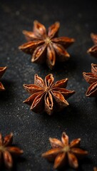 Star anise spice elegantly showcased on a black backdrop.