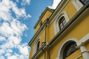 The Catholic church. The old red brick church. A historical building with a religious purpose.