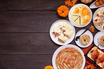 Sticker - Autumn desserts side border. Table scene with a selection of gourmet fall sweet foods. Overhead view over a dark wood background. Copy space.