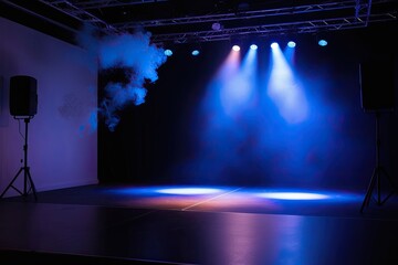 Blue Spotlight Stage with Smoke Effect on Dark Background for Stunning Visuals