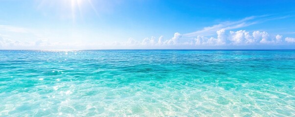 bright blue ocean surface on sunny day with blue sky background