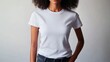 © 69 - A woman models a plain white T-shirt, standing casually, creating a clean canvas for design or logo placement.
