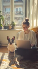 Wall Mural - Cozy home office scene: woman in white sweater works on laptop by sunny window, French Bulldog companion sits nearby, potted plants add greenery.