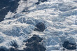 © Asanee - A close up of beautiful frozen glacier ice sheet remaining atop the mountains in Mount Cook National Park, slowly melting due to global warming, South Island, New Zealand.