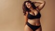 © BlackBird Studio - Glamorous Plus-Size Model in Swimwear Poses for Portrait