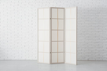 Sticker - Folding screen near white brick wall