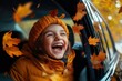 © Alexandra - Cheerful girl is having fun during a family road trip in the fall, surrounded by colorful leaves