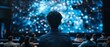 © ngstock - A person sits in a dark room, captivated by a vibrant screen filled with cosmic visuals, surrounded by an engaged audience.