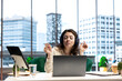 © DC Studio - Business entrepreneur enjoys working with music on her headset, solving daily tasks at her corporate office. Determined powerful female CEO having fun with favorite songs, productivity.