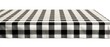 © Avr Di - The black and white checkered tablecloth, cut into shapes, drapes over a long dining table