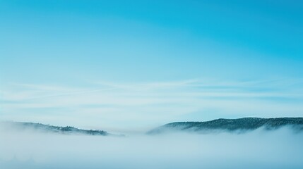 Wall Mural - Blue_sky_with_landscape_in_fog