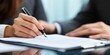 © Obsidian - Close-up of businesswoman signing contract at office. Business people concept. Lawyer
