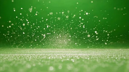 Poster - green screen chromakey footage of glitter particles falling over a blurred sparkly surface, perfect 