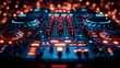 © MaMaKe - A DJ mixer with red and blue lights in a dark setting with blurred lights in the background.