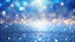 © chaiwat - Delicate light sparkles on blue gradient background