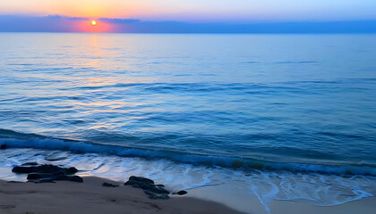 Wall Mural - Seaside Dawn with the Sun Reflected on the Water