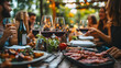© SS Digital - Happy friends having bbq dinner party in restaurant garden - Group of young people drinking red wine and eating meat sitting at lunch table - Food and beverage lifestyle concept