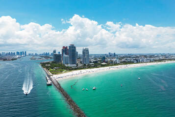 Miami Beach scene from drone, Florida, USA. Miami seaside. Aerial view of Miami Beach and cityscape. Coastline of Miami Beach, aerial view. Famous American landmarks.