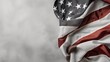 © cusniatul - American Flag Draped on a Grey Surface