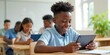 © Reubens Stock Photos - African American Male School Student Engaging in Fun Tablet Learning Session During Class