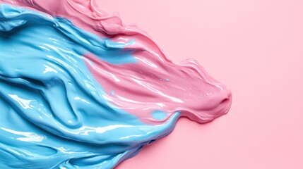 Poster - Smooth blue and pink paint flows together, creating a swirling pattern on a pastel pink backdrop, showcasing the beauty of color blending in an artistic setting