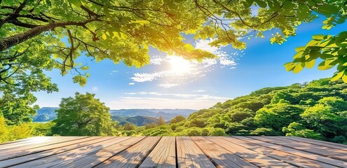 A wooden platform overlooking a beautiful forest landscape, with the sun shining through the trees. Perfect for showcasing products or creating a natural background.