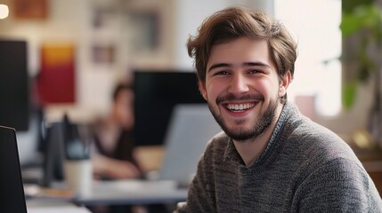 Poster - Young man smiling in modern office setting