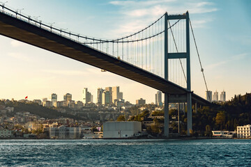 Bridge over the Bosphorus in Istanbul with city skyline in the background