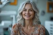 © Vesna - a senior woman smiles brightly showcasing her dental veneers and oral hygiene radiating confidence and happiness in a warm inviting dental office
