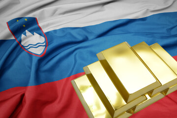 Wall Mural - shining golden bullions on the slovenia flag background.