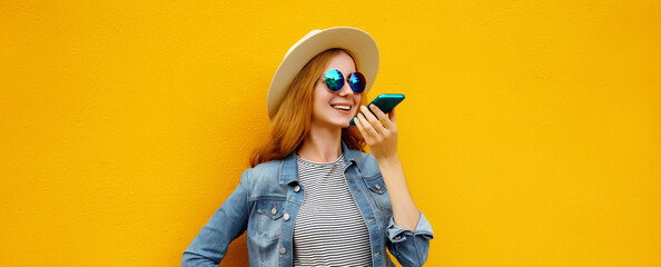 Wall Mural - Happy smiling young woman holding talking on the phone, joyful girl using smartphone, takes calling