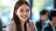 © WS Studio 1985 - Confident Businesswoman Smiling at Office Workspace
