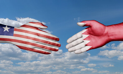 Bahrain and Liberia country handshaking with flags, consensus concept international co-operation illustration