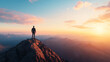 © Denis Yevtekhov - Hiker standing on a mountain peak overlooking a breathtaking sunrise sense of achievement, travel, adventure, scenic landscape, outdoor exploration