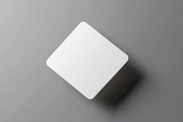  Photo of a blank business card mockup on a grey background, top-down view. Web banner with copy space for text or a logo. Created with Ai