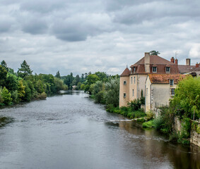 Castle on a river in the town of Montmorillon France