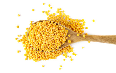 Wall Mural - Yellow lentils pile, uncooked in wooden spoon isolated on white background, top view