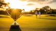© gnoparus - Golden Trophy Cup on Golf Course Green at Sunset