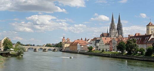 Regensburg Germany. Skyline including the stone bridge over the Danube River, Saint Peter's Church and Regensburg Town Hall in the city of Regensburg.