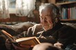 © kornc - An older man is reading a book while wearing headphones
