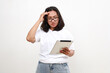 © ArvStd - Portrait of asian business woman looking at digital tablet with worried, stressed and upset face. Isolated on white