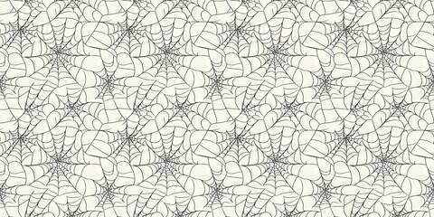 Spider web pattern with an intricate, spooky design. seamless background pattern