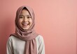 © Yury - Woman with Joyful Expression Smiling Confidently Against Pink Background with Copy Space
