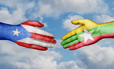 Wall Mural - Myanmar aka Burma and Puerto Rico country handshaking with flags, consensus concept international co-operation illustration