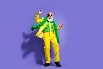 Poster - Full size photo of elegant charismatic aged man have fun dance yellow suit isolated on violet color background